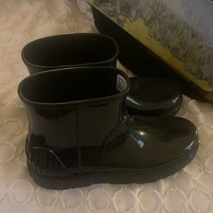 They’re just collecting dust in my closest. UGG Rain Boots